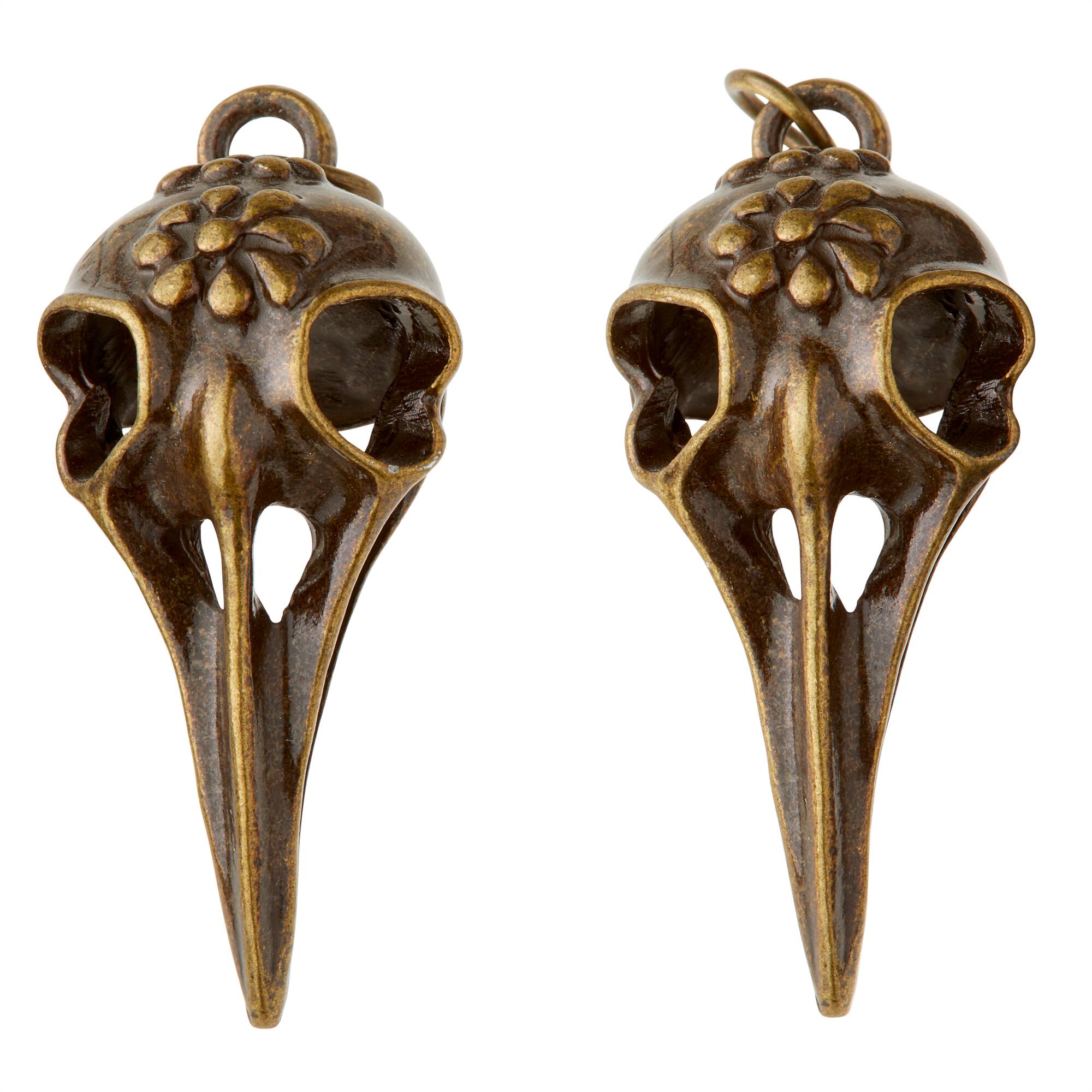 12 Packs: 2 ct. (24 total) Found Objects™ Bird Skull Charms by Bead Landing™